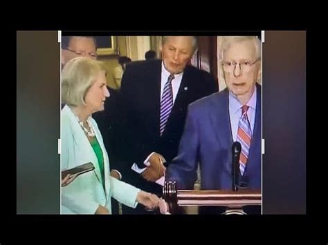 mitch mcconnell video lady in green dress